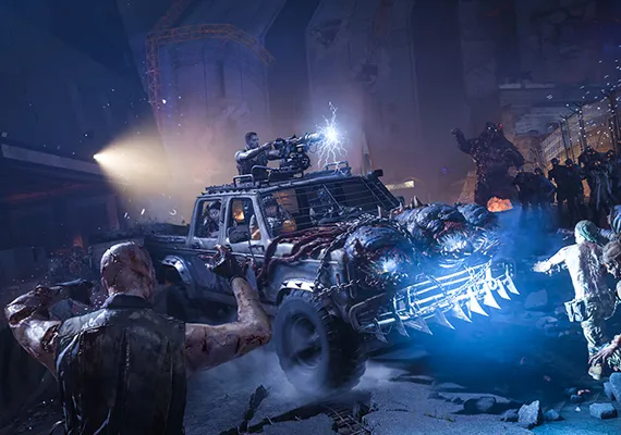 A fortified truck tears through hordes of undead with electrified firepower, showcasing the frantic, over-the-top action of the new Zombies experience. A fortified truck tears through hordes of undead with electrified firepower, showcasing the frantic, over-the-top action of the new Zombies experience.